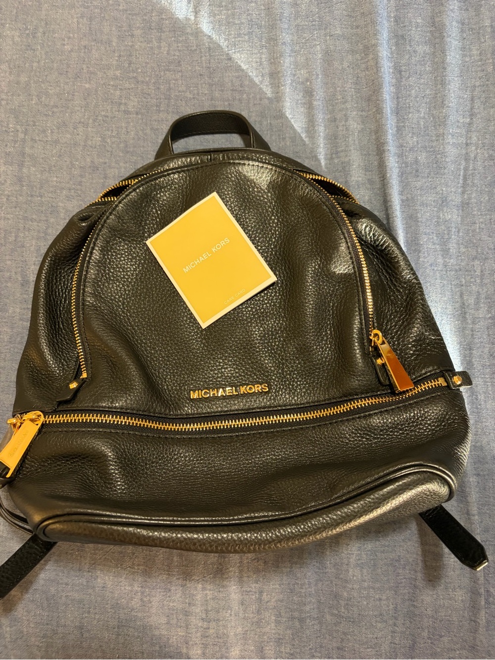 Michael Kors Black Pebbled Leather Backpack with Gold Hardware Accents